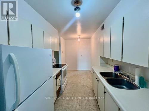 707 - 180 Markham Road, Toronto, ON - Indoor Photo Showing Kitchen With Double Sink