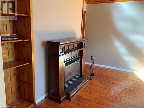 Electric fireplace Living Room - 20 Cape Hurd Road S, Tobermory, ON - Indoor Photo Showing Other Room With Fireplace