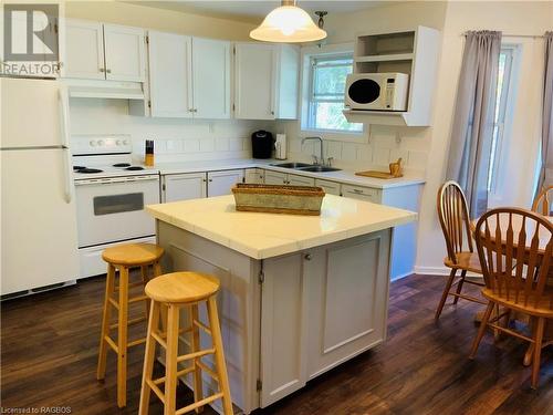 Kitchen view from dining area - 20 Cape Hurd Road S, Tobermory, ON - Indoor Photo Showing Kitchen With Double Sink