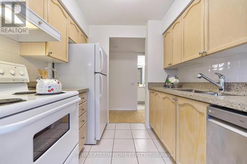 202 - 35 Finch Avenue E, Toronto, ON - Indoor Photo Showing Kitchen With Double Sink