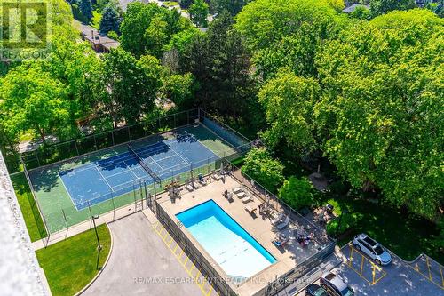 406 - 1201 Northshore Boulevard, Burlington, ON - Outdoor With In Ground Pool