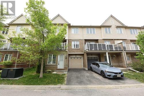 92 - 620 Ferguson Drive, Milton, ON - Outdoor With Balcony With Facade