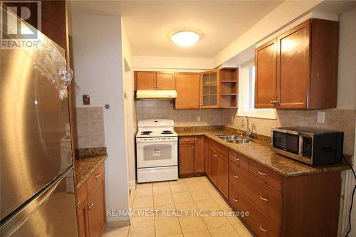 Upper - 11 Tindale Road, Brampton, ON - Indoor Photo Showing Kitchen With Double Sink