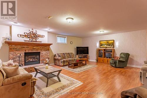 69375 Victoria Drive, South Huron (Centralia), ON - Indoor Photo Showing Living Room With Fireplace