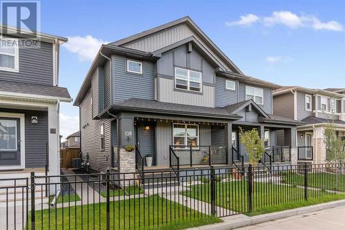 138 Midgrove Greenway Sw, Airdrie, AB - Outdoor With Deck Patio Veranda With Facade