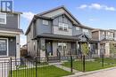 138 Midgrove Greenway Sw, Airdrie, AB  - Outdoor With Deck Patio Veranda With Facade 