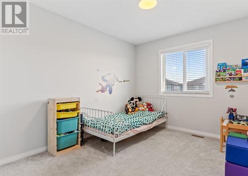 Bedroom #3 - 138 Midgrove Greenway Sw, Airdrie, AB - Indoor Photo Showing Bedroom