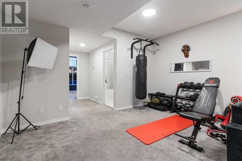 Lower Level - 138 Midgrove Greenway Sw, Airdrie, AB - Indoor Photo Showing Gym Room