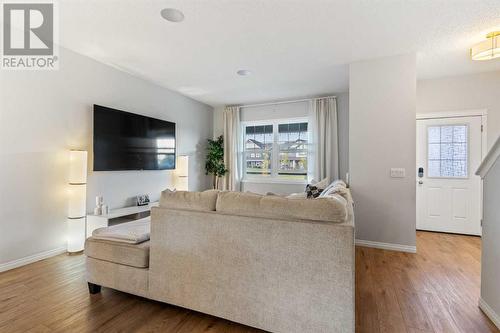 138 Midgrove Greenway Sw, Airdrie, AB - Indoor Photo Showing Living Room