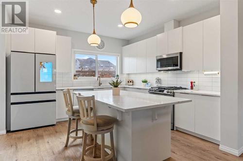 Upgraded Appliances, Lighting & Fixtures - 138 Midgrove Greenway Sw, Airdrie, AB - Indoor Photo Showing Kitchen With Upgraded Kitchen