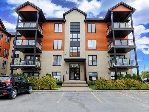 Exterior entrance - 303-3157 Boul. De La Gare, Vaudreuil-Dorion, QC - Outdoor With Facade