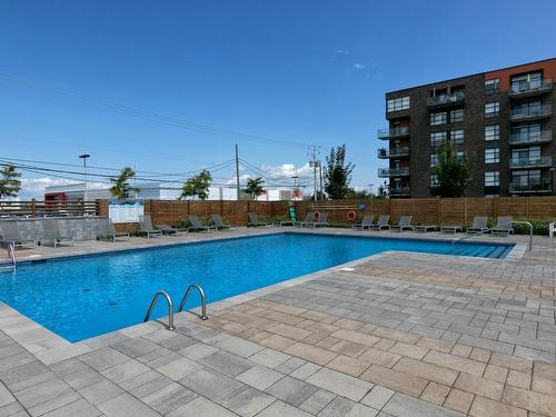 Pool - 303-3157 Boul. De La Gare, Vaudreuil-Dorion, QC - Outdoor With In Ground Pool With Backyard