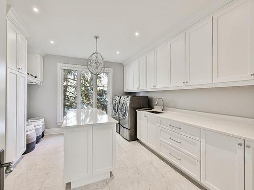 Laundry room - 18 Tsse Pagé, Montréal (L'Île-Bizard/Sainte-Geneviève), QC - Indoor Photo Showing Kitchen