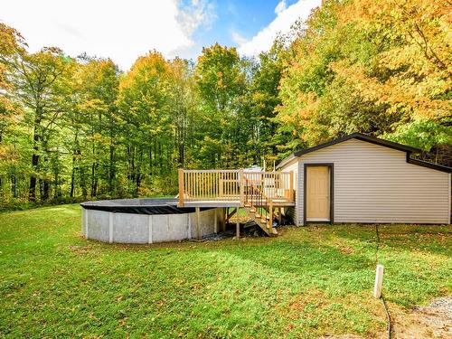 Backyard - 535 Route 222, Maricourt, QC - Outdoor With Above Ground Pool