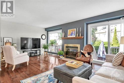 6165 Oak Meadows Drive, Ottawa, ON - Indoor Photo Showing Living Room With Fireplace