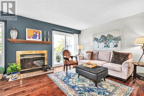 6165 Oak Meadows Drive, Ottawa, ON - Indoor Photo Showing Living Room With Fireplace