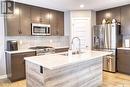 309 Germain Manor, Saskatoon, SK  - Indoor Photo Showing Kitchen With Double Sink With Upgraded Kitchen 