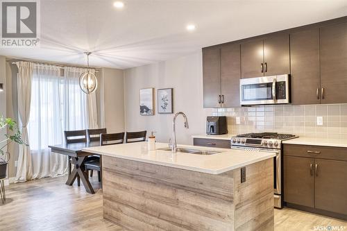 309 Germain Manor, Saskatoon, SK - Indoor Photo Showing Kitchen With Double Sink With Upgraded Kitchen