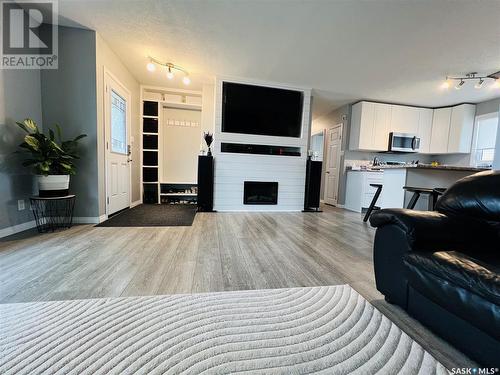 621 Central Avenue S, Swift Current, SK - Indoor Photo Showing Living Room With Fireplace