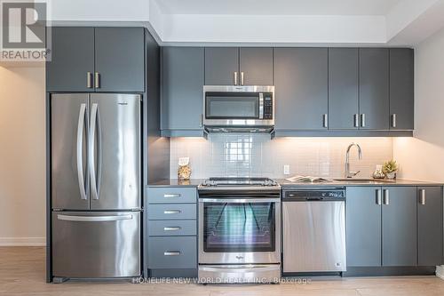 1009 - 8 Nahani Way, Mississauga, ON - Indoor Photo Showing Kitchen With Upgraded Kitchen