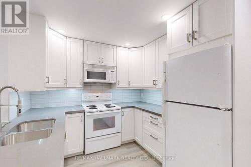 36 Farley Crescent, Toronto, ON - Indoor Photo Showing Kitchen With Double Sink