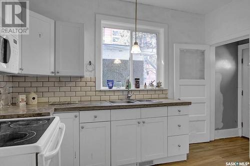 1930 Quebec Street, Regina, SK - Indoor Photo Showing Kitchen With Double Sink