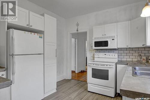 1930 Quebec Street, Regina, SK - Indoor Photo Showing Kitchen With Double Sink