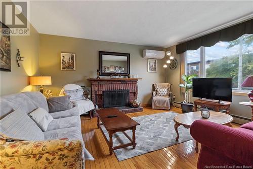 100 Gross Avenue, Moncton, NB - Indoor Photo Showing Living Room With Fireplace