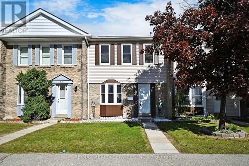 60 - 1020 Central Park Drive, Brampton, ON - Outdoor With Facade