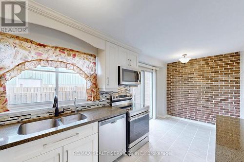 60 - 1020 Central Park Drive, Brampton, ON - Indoor Photo Showing Kitchen With Double Sink