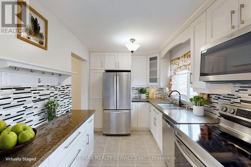 60 - 1020 Central Park Drive, Brampton, ON - Indoor Photo Showing Kitchen With Stainless Steel Kitchen With Double Sink With Upgraded Kitchen