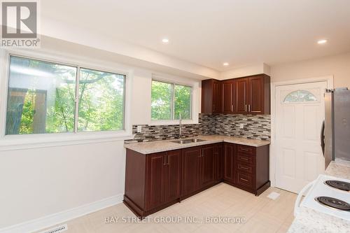 36 Brahms Avenue, Toronto, ON - Indoor Photo Showing Kitchen With Double Sink