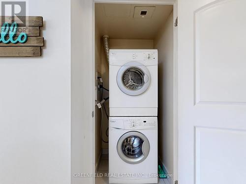 1010 - 55 De Boers Drive, Toronto, ON - Indoor Photo Showing Laundry Room