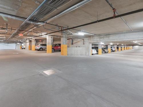 Parking - 218-1945 Rue Adoncour, Longueuil (Le Vieux-Longueuil), QC - Indoor Photo Showing Garage