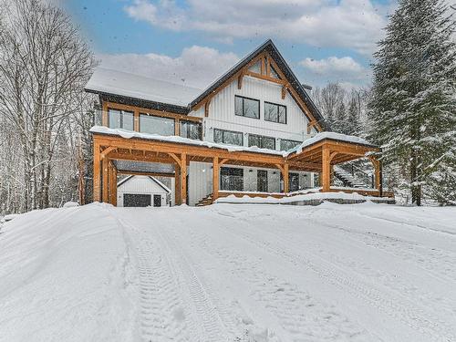 FaÃ§ade - 48 Ch. Coutu, Saint-Donat, QC - Outdoor With Deck Patio Veranda