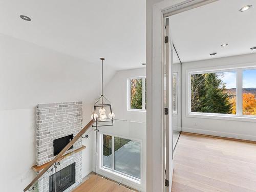 Vue d'ensemble - 48 Ch. Coutu, Saint-Donat, QC - Indoor Photo Showing Other Room With Fireplace