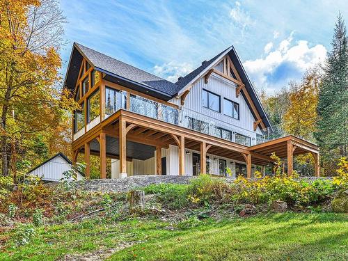 FaÃ§ade - 48 Ch. Coutu, Saint-Donat, QC - Outdoor With Deck Patio Veranda