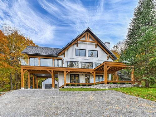 FaÃ§ade - 48 Ch. Coutu, Saint-Donat, QC - Outdoor With Deck Patio Veranda