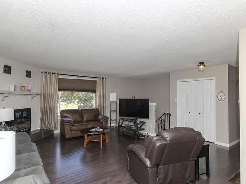 2105 Victoria Avenue E, Thunder Bay, ON - Indoor Photo Showing Living Room With Fireplace