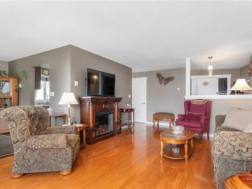 109-2740 Island Hwy South, Campbell River, BC - Indoor Photo Showing Living Room With Fireplace