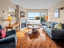 210-2550 Bevan Ave, Sidney, BC  - Indoor Photo Showing Living Room With Fireplace 