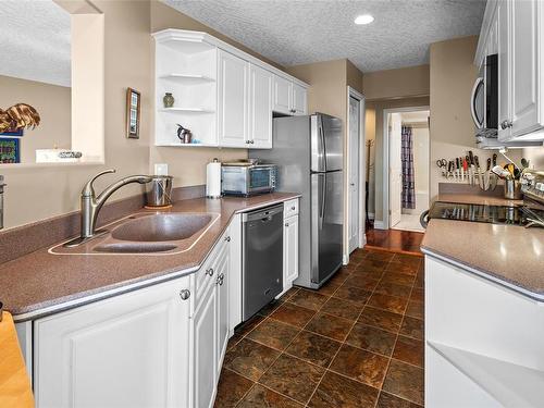 210-2550 Bevan Ave, Sidney, BC - Indoor Photo Showing Kitchen With Stainless Steel Kitchen With Double Sink