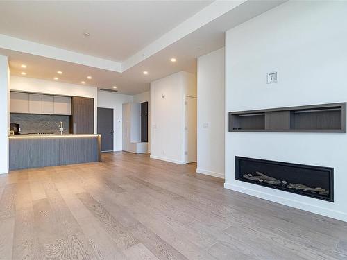 1504-2000 Hannington Rd, Langford, BC - Indoor Photo Showing Living Room With Fireplace