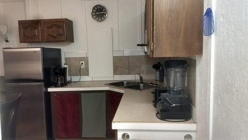 12-6350 33 Highway, Beaverdell, BC - Indoor Photo Showing Kitchen With Double Sink