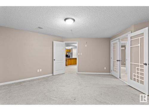 #230 1520 Hammond Gate Ga Nw, Edmonton, AB - Indoor Photo Showing Other Room