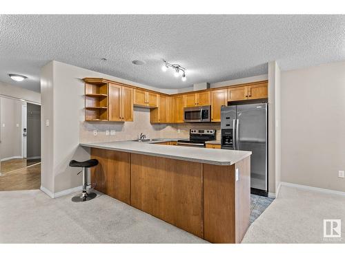 #230 1520 Hammond Gate Ga Nw, Edmonton, AB - Indoor Photo Showing Kitchen