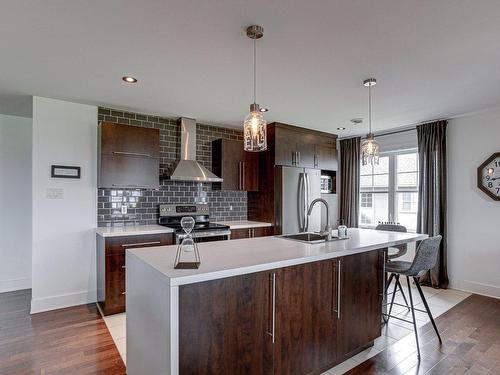 Kitchen - 403-180 Rue Bohémier, Mascouche, QC - Indoor Photo Showing Kitchen With Upgraded Kitchen