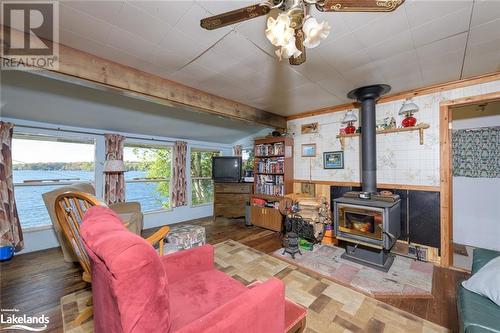 18 Healey Lake, The Archipelago, ON - Indoor Photo Showing Living Room With Fireplace