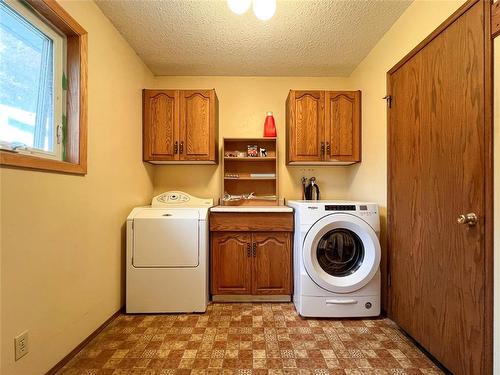 118023 29 (Fairfax) Road N, Minto, MB - Indoor Photo Showing Laundry Room