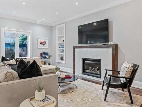 236 Winnett Ave, Toronto, ON - Indoor Photo Showing Living Room With Fireplace